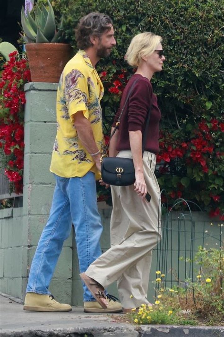 Unveiling The Private Lives Of Charlize Theron's Partners