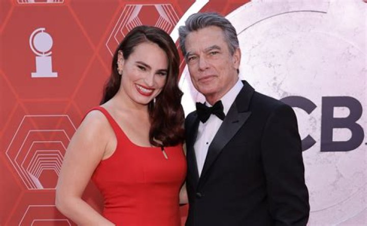 Behind Kathryn Gallagher's Supportive Parents